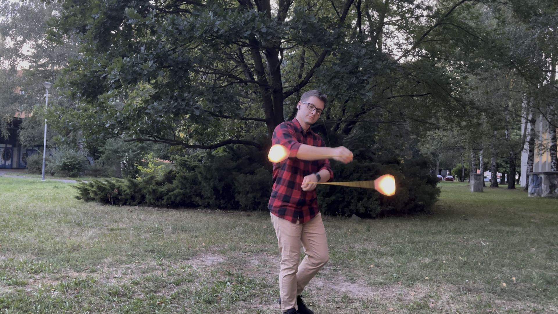 Matěj practicing with LED poi in the park