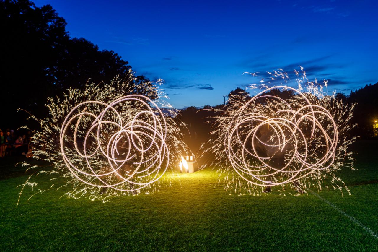 Matěj and Kača performing with pyro poi at the Ostravice town festival 2023