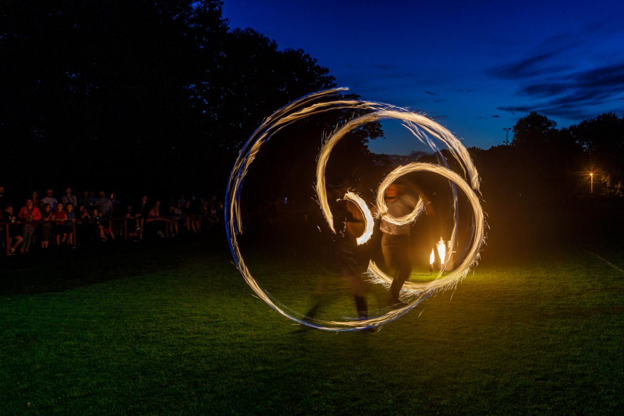 Matěj performing with fire poi at the Ostravice town festival